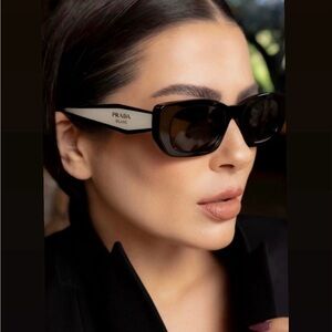 100% authentic Prada Women's Sunglasses in Black and Cream